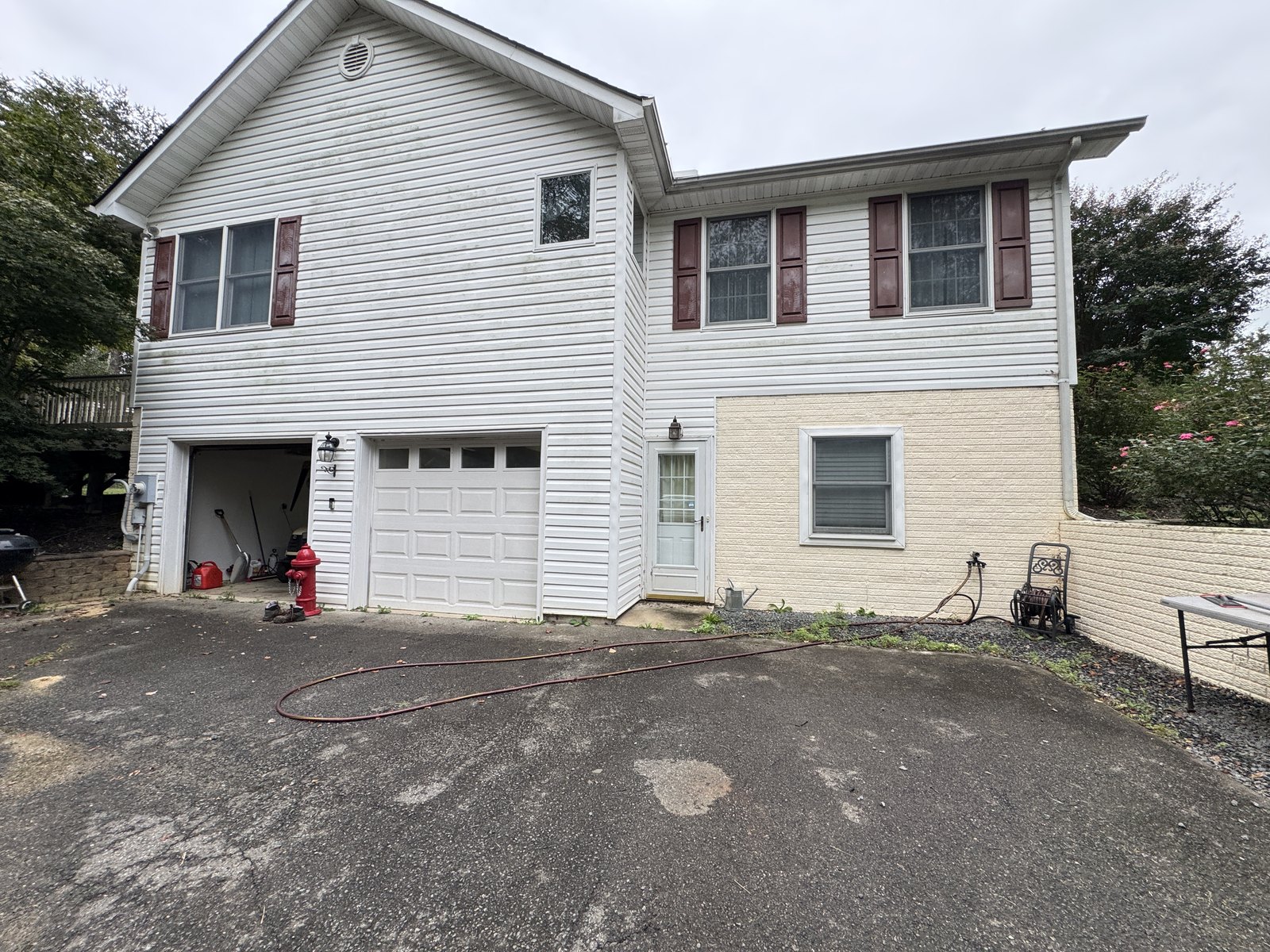 Rear exterior and garage doors at 504 Sanford Dr, Fredericksburg VA
