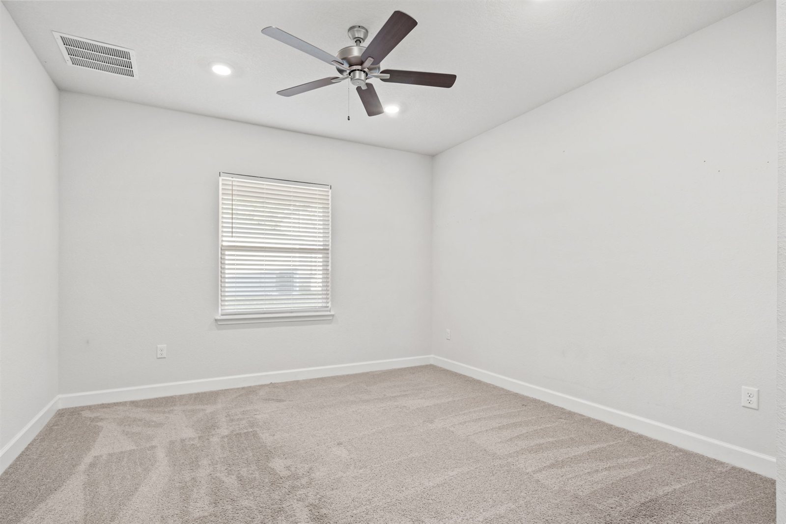 Bedroom with ceiling fan at 9956 Redfish Marsh Cir, Jacksonville FL