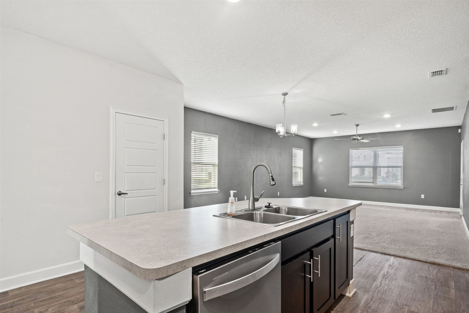 Kitchen overlooking living space at 9956 Redfish Marsh Cir, Jacksonville FL
